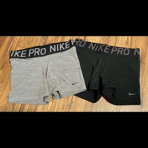 2 pairs of Nike Dri Fit 3” shorts